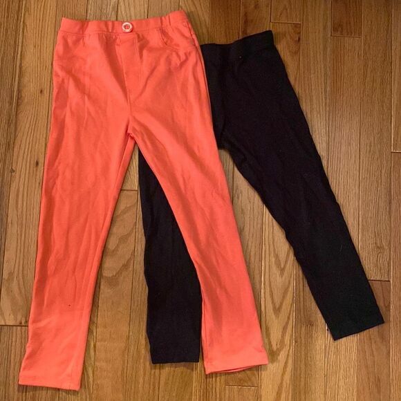 Size 6 leggings. Black is a capri length and the peach is regular length. - Picture 1 of 7